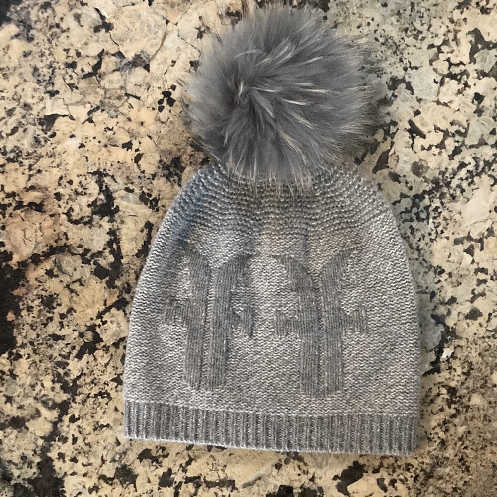 Adorable Frye hat. 92% Merino wool, 8% Cashmere with fur Pom. Perfect condition.